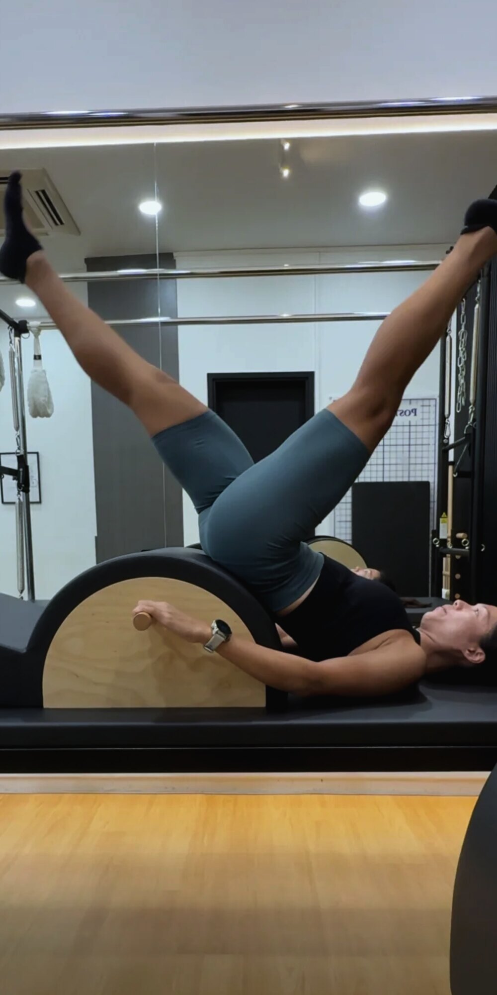 Whole-body connection work over the spine corrector