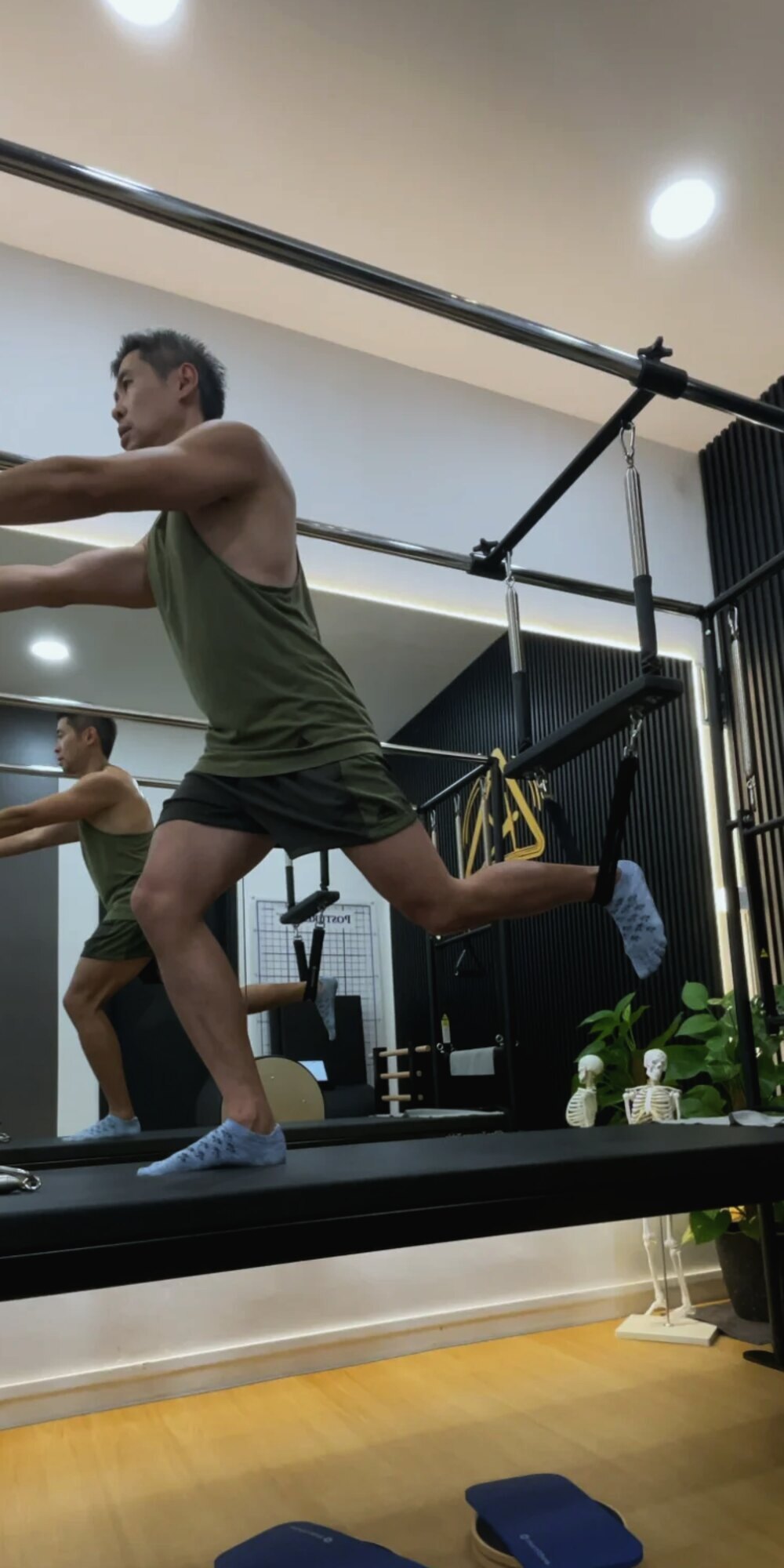 Standing stability work on the trapeze table